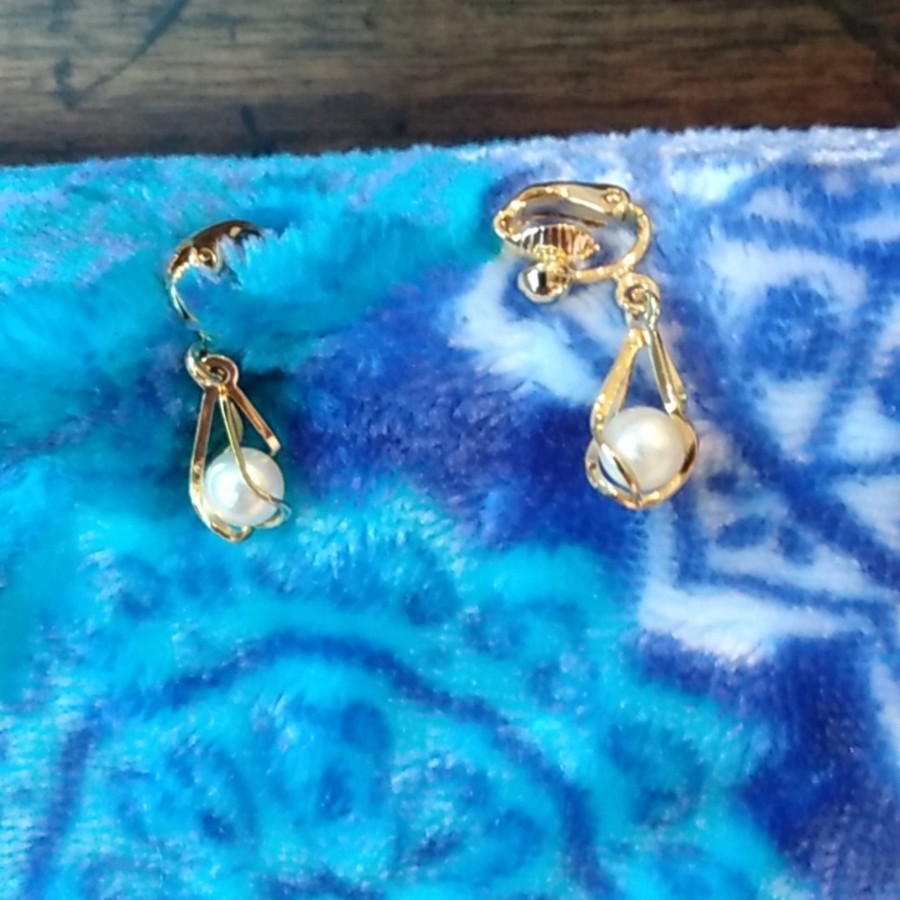 Faux pearl and gold tone earrings